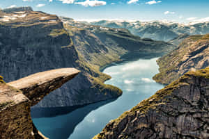 Majestic View From Trolltunga Rock Formation In Norway Wallpaper