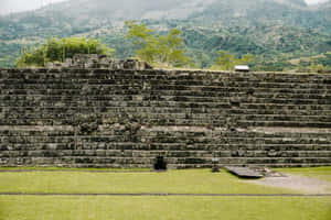 Majestic View Of Ancient Mayan Ruins Of Copan Wallpaper