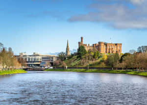 Majestic View Of Inverness, United Kingdom At Sunset Wallpaper