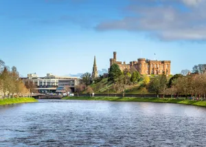 Majestic View Of Inverness, United Kingdom At Sunset Wallpaper