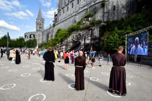 Majestic View Of Lourdes Sanctuary Wallpaper