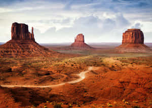 Majestic View Of Monument Valley Navajo Tribal Park Wallpaper