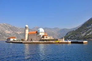 Majestic View Of Our Lady Of The Rocks In Montenegro Wallpaper