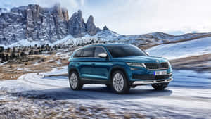 Majestic View Of Skoda Kodiaq On Mountain Road Wallpaper