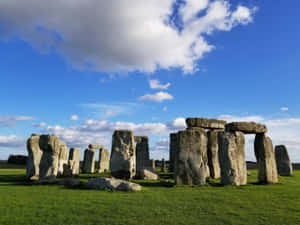 Majestic View Of Stonehenge Under The Brilliant Sky Wallpaper