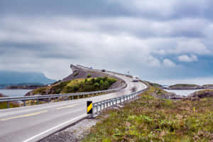 Majestic View Of Storseisundet Bridge On A Cloudy Day Wallpaper