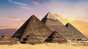 Majestic View Of The Ancient Giza Pyramids Wallpaper