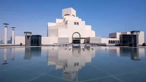 Majestic View Of The Museum Of Islamic Art In Dusky Blue Hues Wallpaper