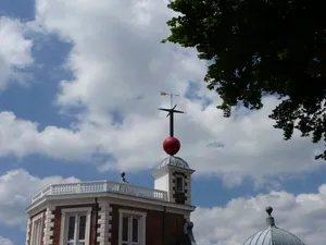 Majestic View Of The Royal Observatory Against A Vibrant Twilight Sky. Wallpaper