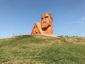 Majestic View Of We Are Our Mountains Monument Wallpaper