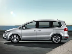 Majestic Volkswagen Sharan Cruising Down The Highway Wallpaper