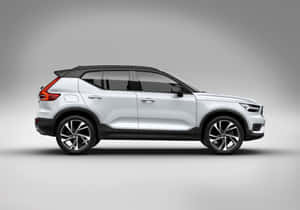 Majestic Volvo Xc40 Suv Dominating The Roadway Wallpaper