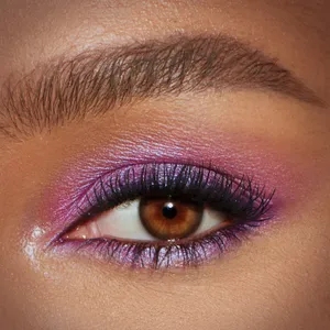 Make A Bold Statement With Purple Eye Shadow Wallpaper