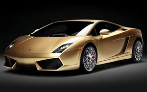 Make A Statement With The Dazzling Gold Lamborghini Wallpaper