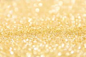 Make Your Artwork Shine With Yellow Glitter Wallpaper