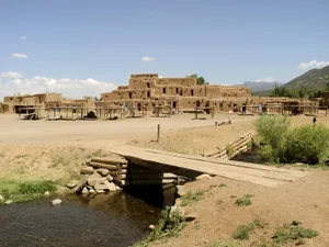 Makeshift Bridge Over Taos Pueblo River Wallpaper
