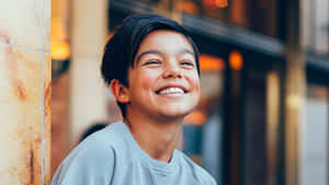 Malachi Barton Smiling Outdoors Wallpaper