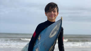 Malachi Barton Surfing Adventure Wallpaper