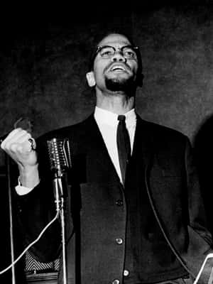 Malcolm X Speakingat Podium Wallpaper