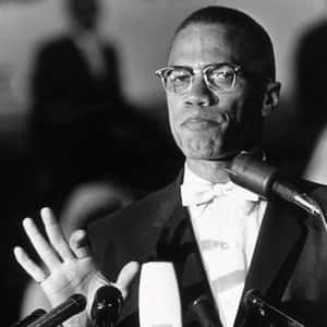 Malcolm X Speakingat Podium Wallpaper