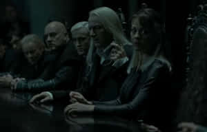 Malfoy Family Gathering Dark Atmosphere Wallpaper