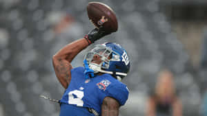 Malik Nabers Catching Football Wallpaper