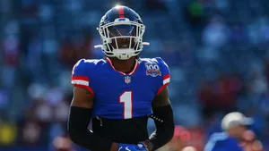 Malik Nabers On Field Wallpaper