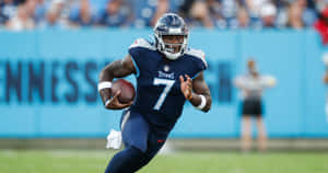 Malik Willis Titans Quarterback Action Wallpaper