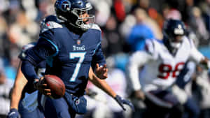 Malik Willis Titans Quarterback Action Wallpaper