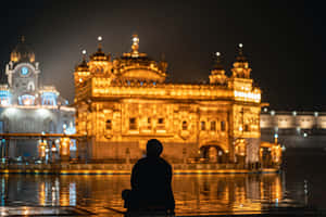 Man And Golden Temple Wallpaper