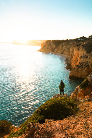 Man At Algarve Beach Iphone Wallpaper