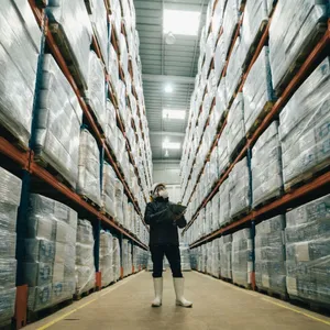 Man Checking Wholesale Products Wallpaper