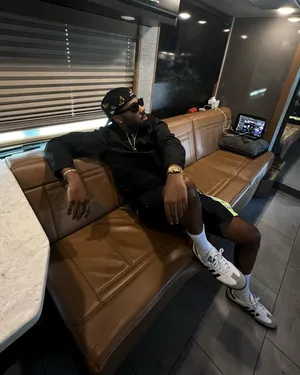 Man Chillingin Luxury R V Lounge Wallpaper