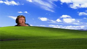 Man Daydreaming In Green Field Wallpaper