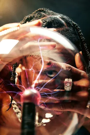 Man Gazing Through Plasma Ball Wallpaper