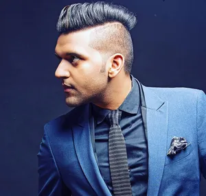 Man In A Suit With Amazing Cutting Style For Hair Wallpaper