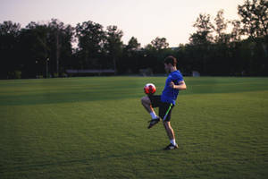 Man In Football Field With Football Hd Wallpaper