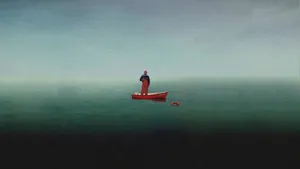 Man On Small Fishing Boat Wallpaper