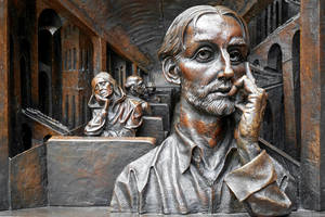 Man On Train Sculpture Wallpaper