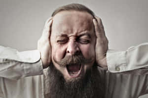 Man Screamingin Frustration.jpg Wallpaper