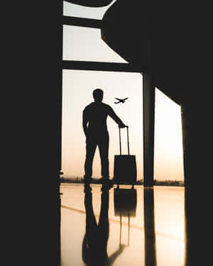 Man Silhouette Ready For World Travel Wallpaper