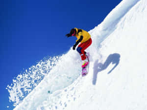 Man Skiing In Steep Mountain Wallpaper