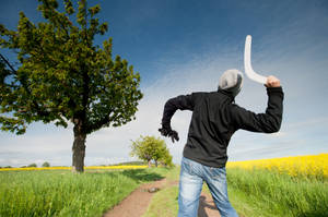 Man Throwing Boomerang Wallpaper