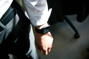 Man Wearing An Apple Smartwatch Wallpaper