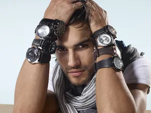 Man Wearing Lots Of Watches Wallpaper