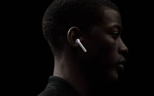 Man With Apple Airpods Wallpaper