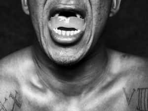 Man With Unorthodox Teeth Wallpaper