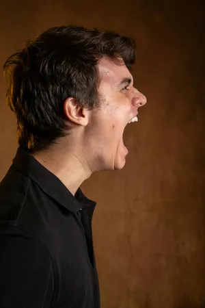Man Yelling Profile View Wallpaper