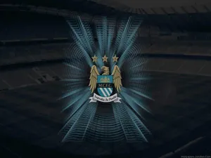 Manchester City Fc Logo Over Shaded Stadium Wallpaper