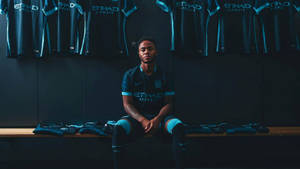 Manchester City Fc Player Sitting Alone Wallpaper